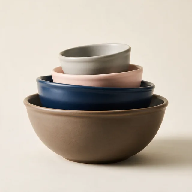 Nesting stoneware mixing bowls, stacked