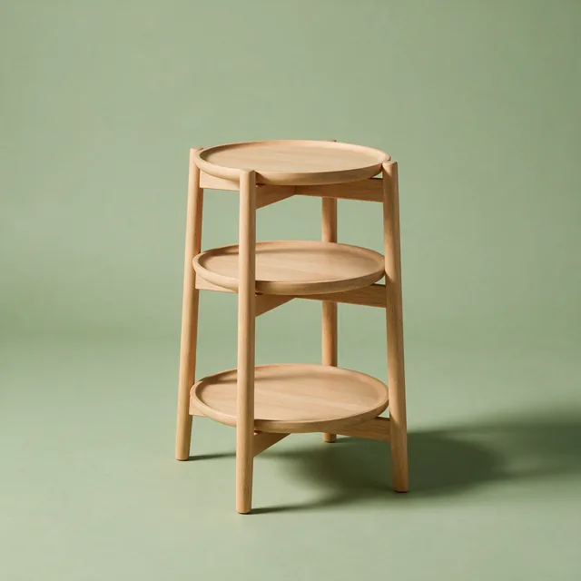 A small three tier wooden plant stand