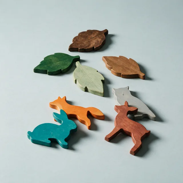 Loose wooden jigsaw pieces cut in shapes